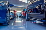 Fototapeta  - New cars at dealer showroom