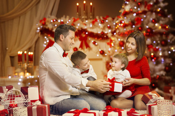 Wall Mural - Christmas Family Portrait, Decorated Xmas Tree, Happy Children and Present Gift Box