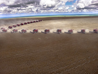 Wall Mural - Mato Grosso, Brazil, March 02, 2008: Mass soybean harvesting at a farm in Campo Verde