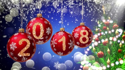 Wall Mural - red balls with numbers 2018 hanging on the background of a blue bokeh and a rotating christmas tree 
