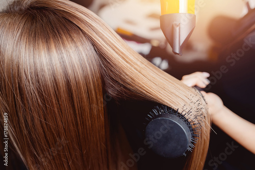 Cuadros en Lienzo Close-up of hair dryer for hair drying, concept hair salon, female stylist