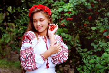 Wall Mural - Beautiful slavonic girl in traditional costume