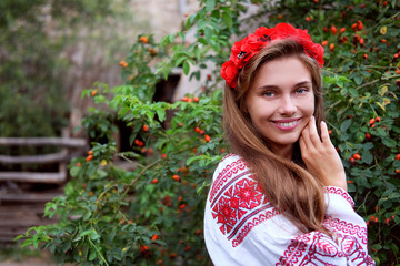 Wall Mural - Beautiful slavonic girl in traditional costume