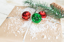 Christmas Gift With Green And Red Jingle Bells