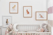 © Africa Studio - Modern interior of child's room with animal pictures