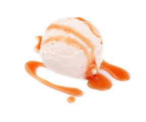 Wall Mural - Scoop of ice cream with caramel topping, isolated on white