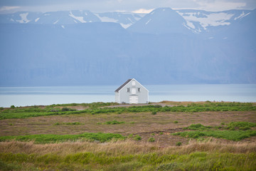 Canvas Print - Siding House at coastline in East Iceland