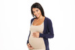 © Drobot Dean - Portrait of a smiling young pregnant girl