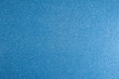texture of blue glitter paper background for design Christmas or New Year's cards