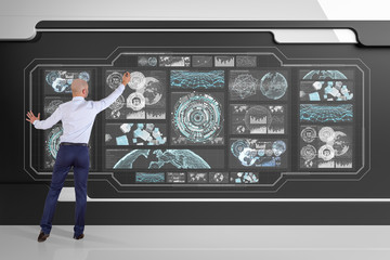 Poster - Businessman using graph screens interface on a board 3D rendering