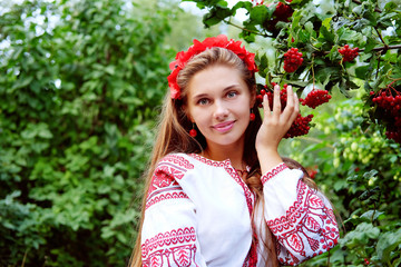 Wall Mural - Beautiful slavonic girl in traditional costume