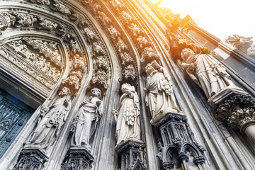 Europe culture concept - view of world cultural heritage, cologne cathedral under dramatic sun and morning blue cloudy sky in Germany