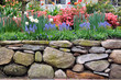 © jStock - Dry Stone Wall and Colorful Garden