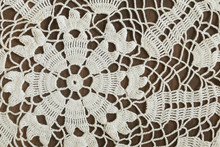 Detail Of Vintage Crochet Doily On Dark Background
