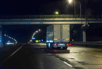 Wall Mural - truck moves on highway at night