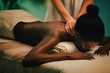 © Lumina/Stocksy - Woman receiving neck massage at spa
