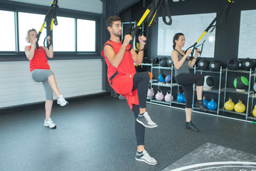 group of people training at gym class