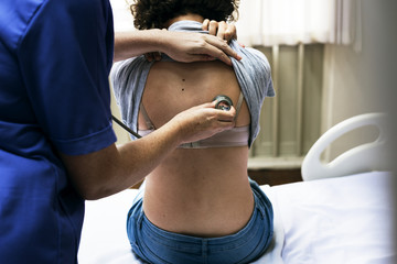 Wall Mural - Doctor checking a patient