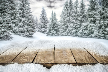 Wall Mural - a table full of snowflakes with space for your product advertisement. winter landscape of trees cove