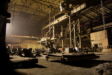 Wall Mural - Dark abandoned rusted ruined industrial interior at night. Voronezh excavator plant