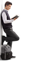 Poster - Teen student leaning against a wall and reading a book