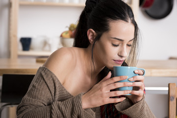 Wall Mural - Woman enjoying beverage in cup