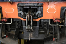 Close Up View If An Orange Clack Front Of A Train Car