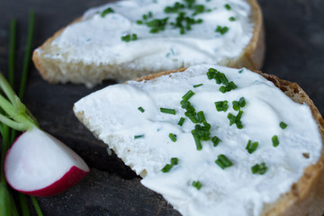 two slice of bread with sour and green onion