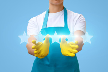 Wall Mural - Cleaning lady shows the rating of five stars .