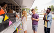 © Syda Productions - happy customers queue at food truck
