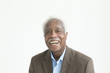 © Julien McRoberts/Blend Images - Portrait of laughing older Black man