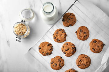 Sticker - Delicious oatmeal cookies with chocolate chips on table