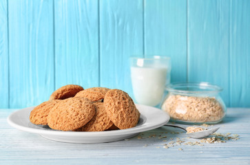 Sticker - Plate with delicious oatmeal cookies on table