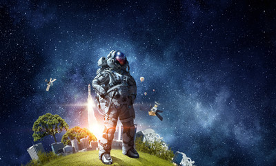 Wall Mural - Space fantasy image with astronaut. Mixed media