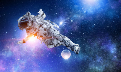 Wall Mural - astronaut play soccer game
