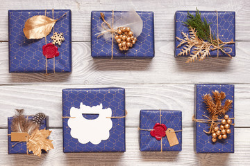 Sticker - Christmas presents on wooden background