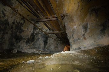 Underground mine shaft iron ore tunnel gallery with pipes