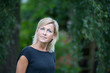 © jeancliclac - Portrait of a cute blond scandinavian woman shot outdoor