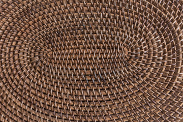 Wooden knitted oval pad background