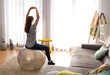 © ikostudio - Doing exercise at home