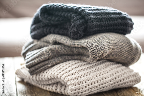 Fotomural stack of cozy knitted sweaters