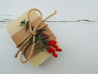 Handmade natural bath spa lavender soap on vintage wooden background. Soap making. Soap bars. Spa, skin care.