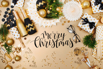 Christmas decoration background in golden and black colors. Flat lay, top view