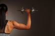 © Samo Trebizan - Beautuful hispanic woman workout with dumbbells studio portrait