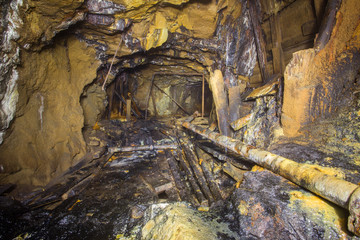 Underground abandoned gold ore mine shaft tunnel gallery passage