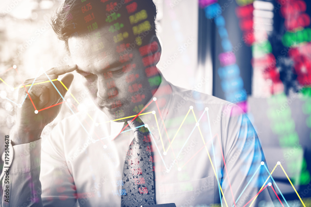 BUSINESS MAN with stress action in office with double exposure with business graph chart financial concept