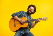 Cheerful Musician With Guitar