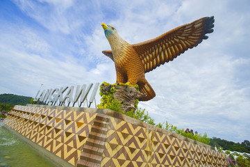 Wall Mural - Langkawi, Malaysia - 3rd September 2017: Shot of Langkawi's famous landmark the Eagle square, Dataran Lang, from the sea in front of it.