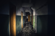 Walkway In Creepy Abandoned Building, Dark Scary Corridor With Many Doors, Horror Background Concept