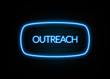 Outreach  - colorful Neon Sign on brickwall
